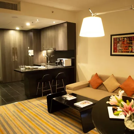 Novotel Kolkata Hotel And Residences Exterior photo A living room with a kitchen