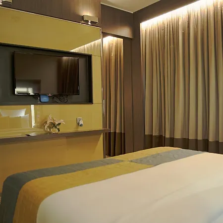 Novotel Kolkata Hotel And Residences Exterior photo A bedroom in the hotel